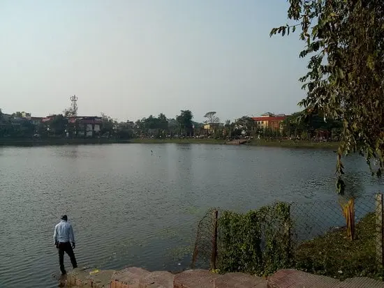 Scenic view of a tranquil lake in Cooch Behar, showcasing the natural beauty and serene environment of the area